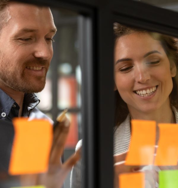 Man and woman creating project map